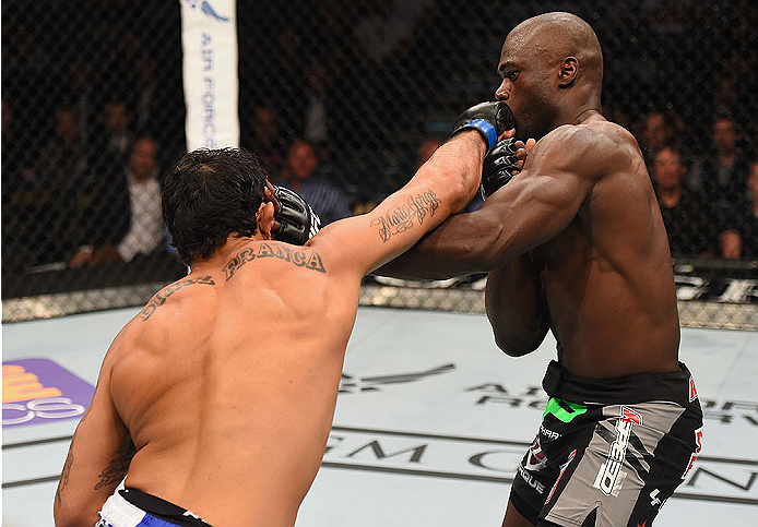 LAS VEGAS, NV - MAY 23: (L-R) Rafael Natal of Brazil punches Uriah Hall in their middleweight bout during the UFC 187 event at the MGM Grand Garden Arena on May 23, 2015 in Las Vegas, Nevada. (Photo by Josh Hedges/Zuffa LLC/Zuffa LLC via Getty Images)