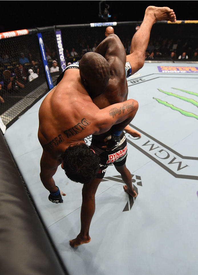 LAS VEGAS, NV - MAY 23: Uriah Hall picks up Rafael Natal of Brazil in their middleweight bout during the UFC 187 event at the MGM Grand Garden Arena on May 23, 2015 in Las Vegas, Nevada. (Photo by Josh Hedges/Zuffa LLC/Zuffa LLC via Getty Images)