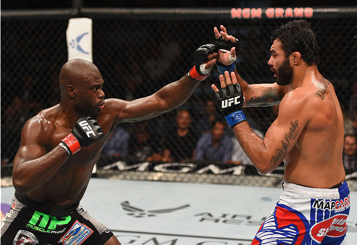 LAS VEGAS, NV - MAY 23: (L-R) Uriah Hall punches Rafael Natal of Brazil in their middleweight bout during the UFC 187 event at the MGM Grand Garden Arena on May 23, 2015 in Las Vegas, Nevada. (Photo by Josh Hedges/Zuffa LLC/Zuffa LLC via Getty Images)