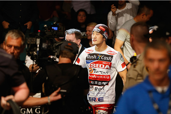 LAS VEGAS, NV - MAY 23:  Dong Hyun Kim walks to the Octagon to face Josh Burkman in their welterweight bout during the UFC 187 event at the MGM Grand Garden Arena on May 23, 2015 in Las Vegas, Nevada.  (Photo by Christian Petersen/Zuffa LLC/Zuffa LLC via 