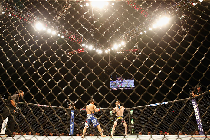 LAS VEGAS, NV - MAY 23:  (L-R) John Dodson and Zach Makovsky face off in their flyweight bout during the UFC 187 event at the MGM Grand Garden Arena on May 23, 2015 in Las Vegas, Nevada.  (Photo by Christian Petersen/Zuffa LLC/Zuffa LLC via Getty Images)