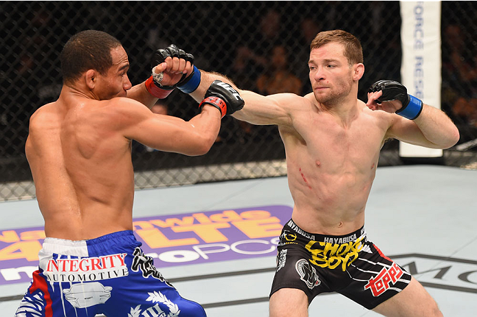 LAS VEGAS, NV - MAY 23: (R-L) Zach Makovsky punches John Dodson in their flyweight bout during the UFC 187 event at the MGM Grand Garden Arena on May 23, 2015 in Las Vegas, Nevada. (Photo by Josh Hedges/Zuffa LLC/Zuffa LLC via Getty Images)