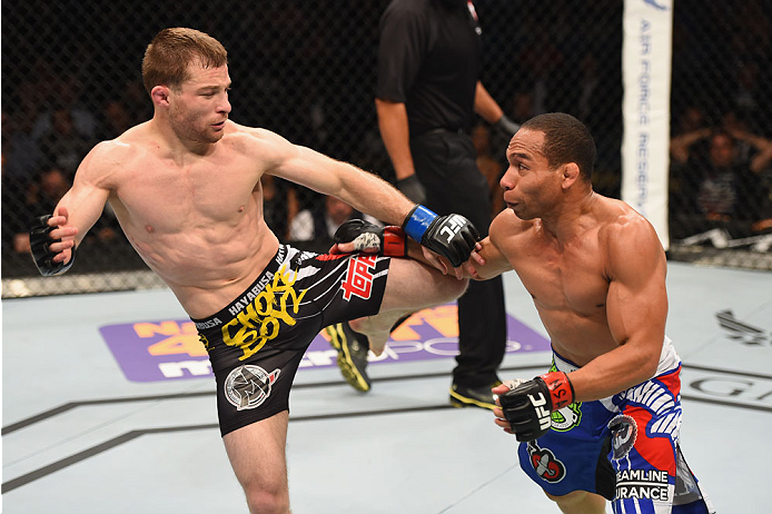 LAS VEGAS, NV - MAY 23: (L-R) Zach Makovsky kicks John Dodson in their flyweight bout during the UFC 187 event at the MGM Grand Garden Arena on May 23, 2015 in Las Vegas, Nevada. (Photo by Josh Hedges/Zuffa LLC/Zuffa LLC via Getty Images)