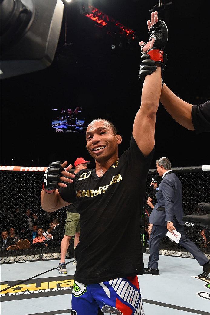 LAS VEGAS, NV - MAY 23:  John Dodson reacts to his victory over Zach Makovsky in their flyweight bout during the UFC 187 event at the MGM Grand Garden Arena on May 23, 2015 in Las Vegas, Nevada.  (Photo by Josh Hedges/Zuffa LLC/Zuffa LLC via Getty Images)