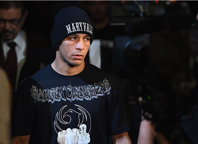 LAS VEGAS, NV - MAY 23:  John Moraga walks to the Octagon to face Joseph Benavidez in their flyweight bout during the UFC 187 event at the MGM Grand Garden Arena on May 23, 2015 in Las Vegas, Nevada.  (Photo by Josh Hedges/Zuffa LLC/Zuffa LLC via Getty Im