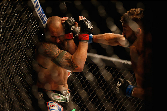 LAS VEGAS, NV - MAY 23:  (R-L) Andrei Arlovski punches Travis Browne in their heavyweight bout during the UFC 187 event at the MGM Grand Garden Arena on May 23, 2015 in Las Vegas, Nevada.  (Photo by Christian Petersen/Zuffa LLC/Zuffa LLC via Getty Images)