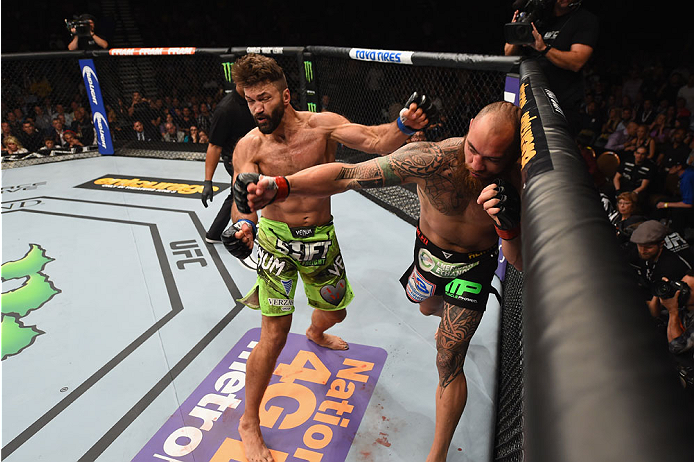 LAS VEGAS, NV - MAY 23: (L-R) Andrei Arlovski and Travis Browne exchange punches in their heavyweight bout during the UFC 187 event at the MGM Grand Garden Arena on May 23, 2015 in Las Vegas, Nevada. (Photo by Josh Hedges/Zuffa LLC/Zuffa LLC via Getty I