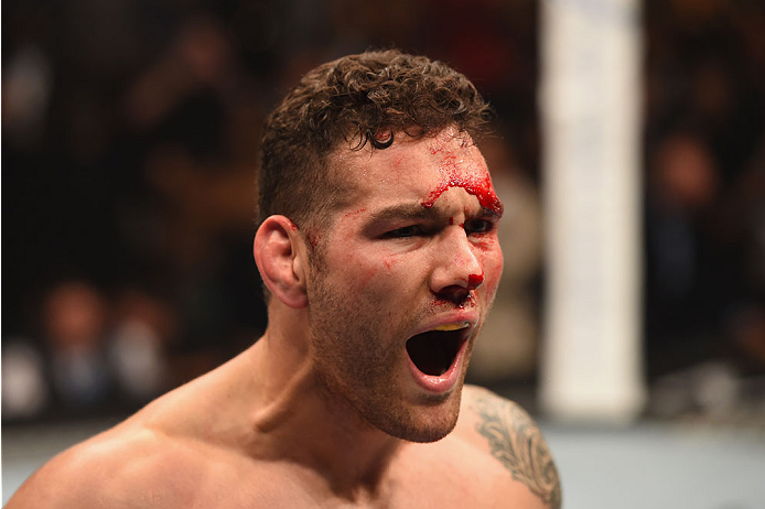 LAS VEGAS, NV - MAY 23: Chris Weidman reacts to his victory over Vitor Belfort of Brazil in their UFC middleweight championship bout during the UFC 187 event at the MGM Grand Garden Arena on May 23, 2015 in Las Vegas, Nevada. (Photo by Josh Hedges/Zuffa