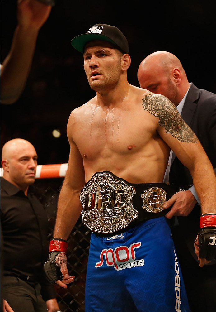LAS VEGAS, NV - MAY 23: Chris Weidman reacts to his victory over Vitor Belfort of Brazil in their UFC middleweight championship bout during the UFC 187 event at the MGM Grand Garden Arena on May 23, 2015 in Las Vegas, Nevada. (Photo by Christian Peterse
