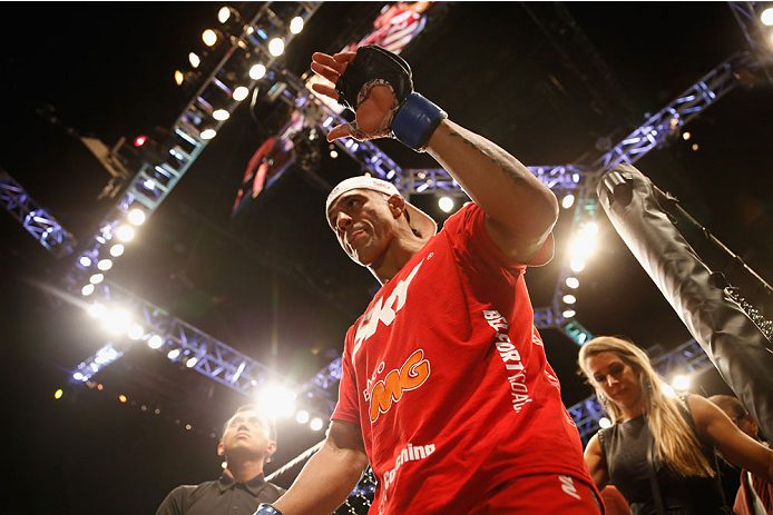 LAS VEGAS, NV - MAY 23:  Vitor Belfort of Brazil exits the Octagon after his loss to Chris Weidman their UFC middleweight championship bout during the UFC 187 event at the MGM Grand Garden Arena on May 23, 2015 in Las Vegas, Nevada.  (Photo by Christian P