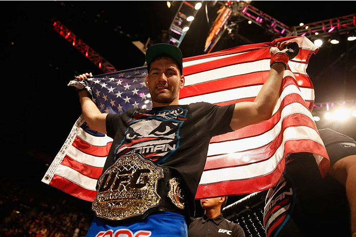 LAS VEGAS, NV - MAY 23:  Chris Weidman reacts to his victory over Vitor Belfort of Brazil in their UFC middleweight championship bout during the UFC 187 event at the MGM Grand Garden Arena on May 23, 2015 in Las Vegas, Nevada.  (Photo by Christian Peterse