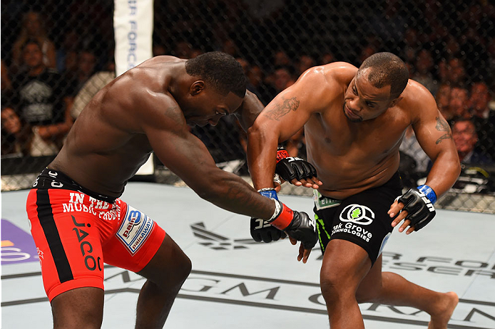 LAS VEGAS, NV - MAY 23: (R-L) Daniel Cormier punches Anthony Johnson in their UFC light heavyweight championship bout during the UFC 187 event at the MGM Grand Garden Arena on May 23, 2015 in Las Vegas, Nevada. (Photo by Josh Hedges/Zuffa LLC/Zuffa LLC
