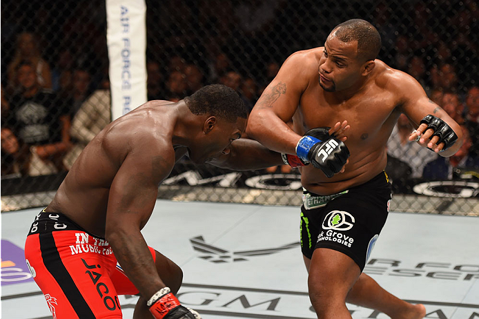 LAS VEGAS, NV - MAY 23: (R-L) Daniel Cormier punches Anthony Johnson in their UFC light heavyweight championship bout during the UFC 187 event at the MGM Grand Garden Arena on May 23, 2015 in Las Vegas, Nevada. (Photo by Josh Hedges/Zuffa LLC/Zuffa LLC