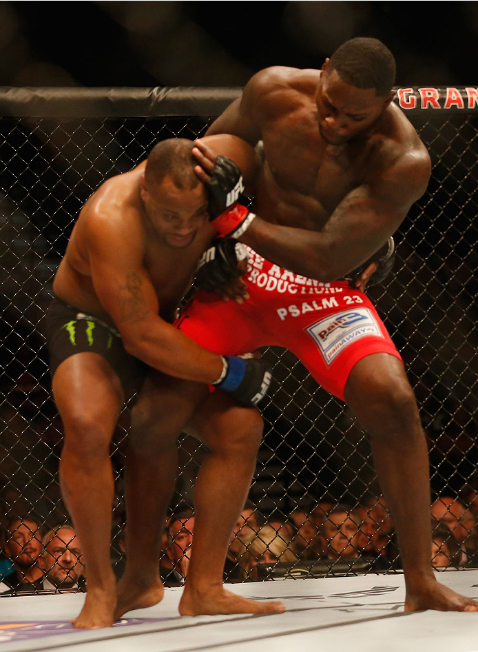 LAS VEGAS, NV - MAY 23:  (L-R) Daniel Cormier attempts to take down Anthony Johnson in their UFC light heavyweight championship bout during the UFC 187 event at the MGM Grand Garden Arena on May 23, 2015 in Las Vegas, Nevada.  (Photo by Christian Petersen