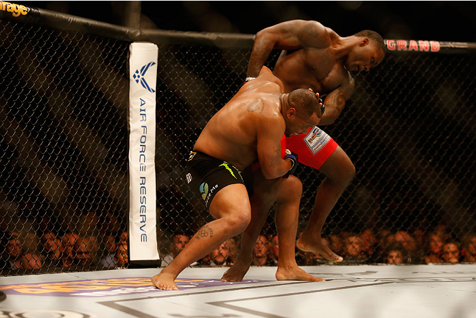 LAS VEGAS, NV - MAY 23:  (L-R) Daniel Cormier attempts to take down Anthony Johnson in their UFC light heavyweight championship bout during the UFC 187 event at the MGM Grand Garden Arena on May 23, 2015 in Las Vegas, Nevada.  (Photo by Christian Petersen