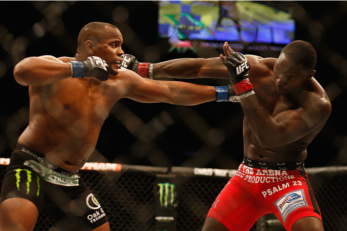 LAS VEGAS, NV - MAY 23: (L-R) Daniel Cormier punches Anthony Johnson in their UFC light heavyweight championship bout during the UFC 187 event at the MGM Grand Garden Arena on May 23, 2015 in Las Vegas, Nevada. (Photo by Christian Petersen/Zuffa LLC/Zuf