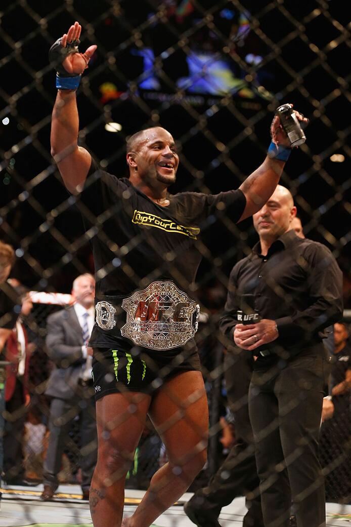LAS VEGAS, NV - MAY 23: Daniel Cormier reacts to his victory over Anthony Johnson in their UFC light heavyweight championship bout during the UFC 187 event at the MGM Grand Garden Arena on May 23, 2015 in Las Vegas, Nevada. (Photo by Christian Petersen/