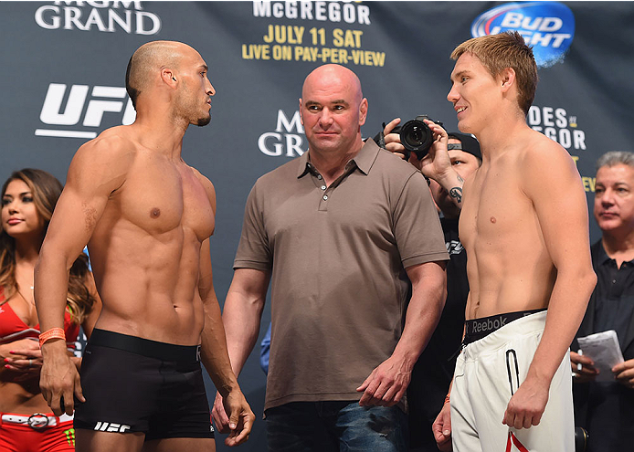 LAS VEGAS, NV - JULY 10:  (L-R) Yosdenis Cedeno and Cody Pfister face off during the UFC 189 weigh-in inside MGM Grand Garden Arena on July 10, 2015 in Las Vegas, Nevada.  (Photo by Josh Hedges/Zuffa LLC/Zuffa LLC via Getty Images)