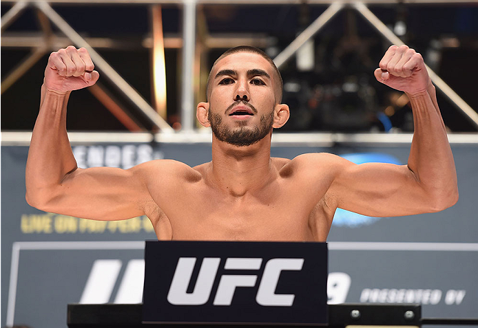 LAS VEGAS, NV - JULY 10:  Louis Smolka steps onto the scale during the UFC 189 weigh-in inside MGM Grand Garden Arena on July 10, 2015 in Las Vegas, Nevada.  (Photo by Josh Hedges/Zuffa LLC/Zuffa LLC via Getty Images)