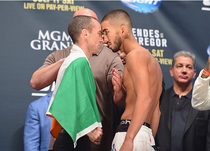 LAS VEGAS, NV - JULY 10: (L-R) Neil Seery and Louis Smolka face off during the UFC 189 weigh-in inside MGM Grand Garden Arena on July 10, 2015 in Las Vegas, Nevada. (Photo by Josh Hedges/Zuffa LLC/Zuffa LLC via Getty Images)