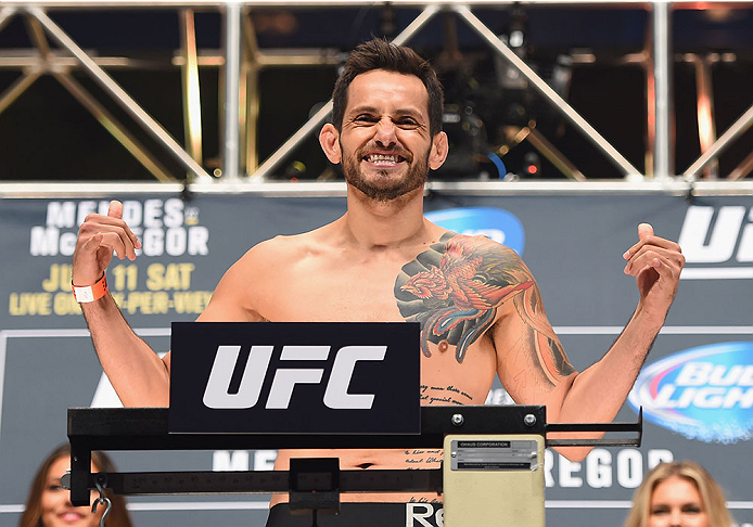 LAS VEGAS, NV - JULY 10:  Henry Briones steps onto the scale during the UFC 189 weigh-in inside MGM Grand Garden Arena on July 10, 2015 in Las Vegas, Nevada.  (Photo by Josh Hedges/Zuffa LLC/Zuffa LLC via Getty Images)