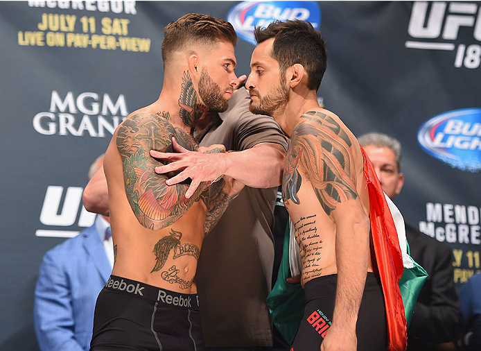 LAS VEGAS, NV - JULY 10: (L-R) Cody Garbrandt and Henry Briones face off during the UFC 189 weigh-in inside MGM Grand Garden Arena on July 10, 2015 in Las Vegas, Nevada. (Photo by Josh Hedges/Zuffa LLC/Zuffa LLC via Getty Images)