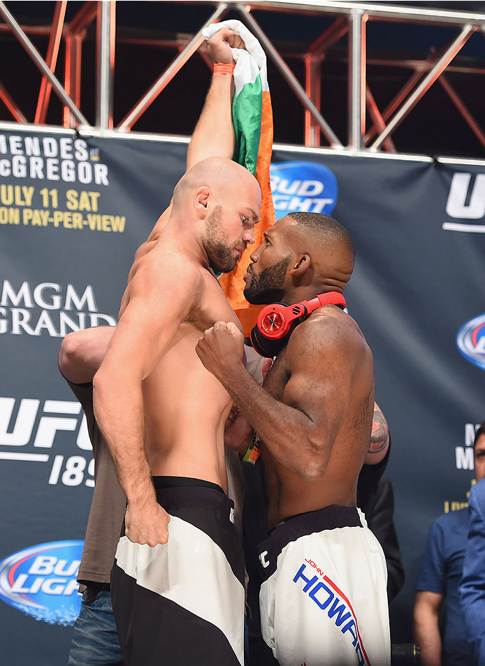 LAS VEGAS, NV - JULY 10:  (L-R) Cathal Pendred and John Howard face off during the UFC 189 weigh-in inside MGM Grand Garden Arena on July 10, 2015 in Las Vegas, Nevada.  (Photo by Josh Hedges/Zuffa LLC/Zuffa LLC via Getty Images)