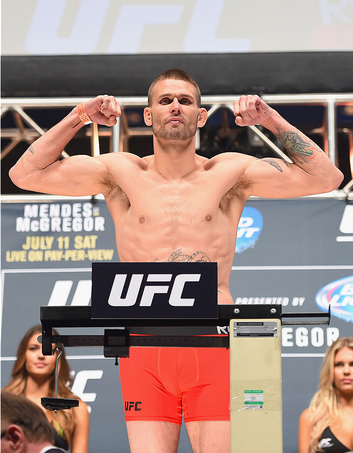 LAS VEGAS, NV - JULY 10:  Tim Means steps onto the scale during the UFC 189 weigh-in inside MGM Grand Garden Arena on July 10, 2015 in Las Vegas, Nevada.  (Photo by Josh Hedges/Zuffa LLC/Zuffa LLC via Getty Images)