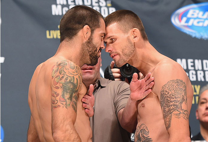 LAS VEGAS, NV - JULY 10:  (L-R) Matt Brown and Tim Means face off during the UFC 189 weigh-in inside MGM Grand Garden Arena on July 10, 2015 in Las Vegas, Nevada.  (Photo by Josh Hedges/Zuffa LLC/Zuffa LLC via Getty Images)