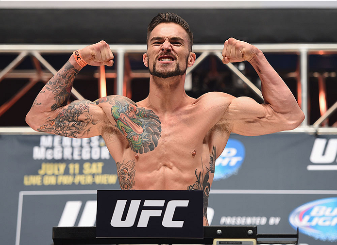 LAS VEGAS, NV - JULY 10:  Brandon Thatch steps onto the scale during the UFC 189 weigh-in inside MGM Grand Garden Arena on July 10, 2015 in Las Vegas, Nevada.  (Photo by Josh Hedges/Zuffa LLC/Zuffa LLC via Getty Images)