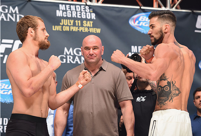 LAS VEGAS, NV - JULY 10:  (L-R) Gunnar Nelson and Brandon Thatch face off during the UFC 189 weigh-in inside MGM Grand Garden Arena on July 10, 2015 in Las Vegas, Nevada.  (Photo by Josh Hedges/Zuffa LLC/Zuffa LLC via Getty Images)