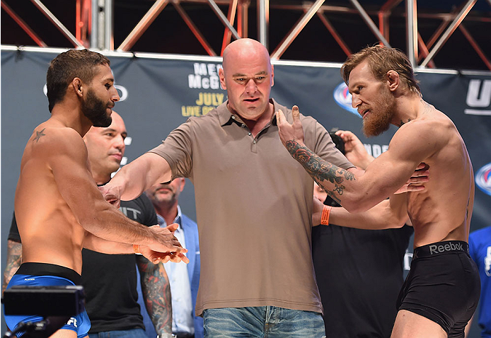 LAS VEGAS, NV - JULY 10:  (L-R) Chad Mendes and Conor McGregor face off during the UFC 189 weigh-in inside MGM Grand Garden Arena on July 10, 2015 in Las Vegas, Nevada.  (Photo by Josh Hedges/Zuffa LLC/Zuffa LLC via Getty Images)