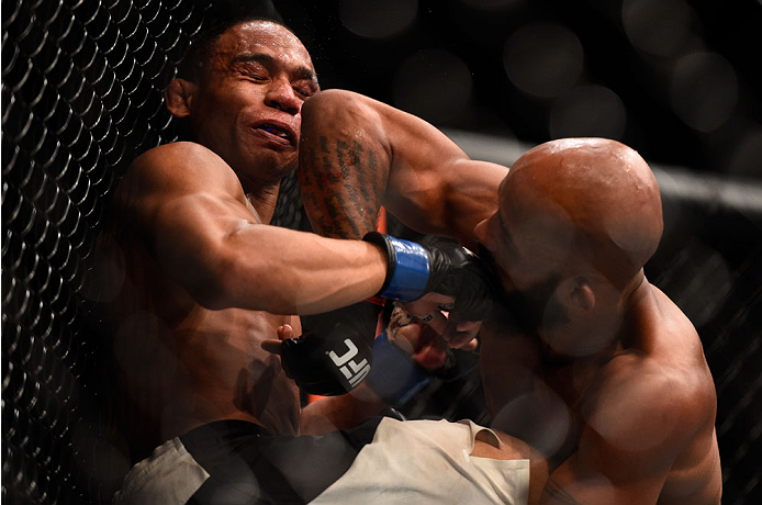 LAS VEGAS, NV - SEPTEMBER 05: (R-L) Demetrious Johnson elbows John Dodson in their flyweight championship bout during the UFC 191 event inside MGM Grand Garden Arena on September 5, 2015 in Las Vegas, Nevada. (Photo by Jeff Bottari/Zuffa LLC/Zuffa LLC vi