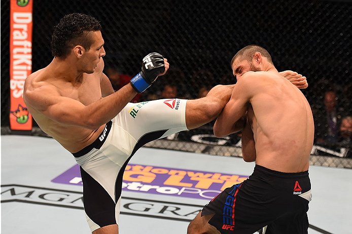 LAS VEGAS, NV - DECEMBER 12: (L-R) Marcio Alexandre of Brazil kicks Court McGee in their welterweight bout during the UFC 194 event inside MGM Grand Garden Arena on December 12, 2015 in Las Vegas, Nevada.  (Photo by Josh Hedges/Zuffa LLC/Zuffa LLC via Get