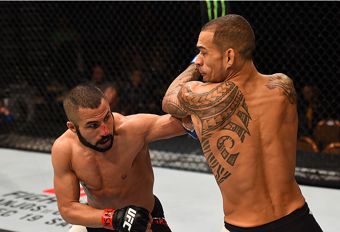 LAS VEGAS, NV - DECEMBER 12: (L-R) John Makedssi of Canada punches Yancy Medeiros in their lightweight bout during the UFC 194 event inside MGM Grand Garden Arena on December 12, 2015 in Las Vegas, Nevada. (Photo by Josh Hedges/Zuffa LLC/Zuffa LLC via Ge
