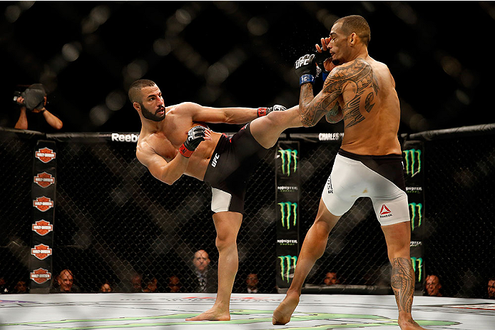 LAS VEGAS, NV - DECEMBER 12: (L-R) John Makedssi of Canada kicks Yancy Medeiros in their lightweight bout during the UFC 194 event inside MGM Grand Garden Arena on December 12, 2015 in Las Vegas, Nevada.  (Photo by Christian Petersen/Zuffa LLC/Zuffa LLC v