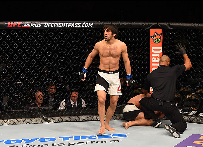 LAS VEGAS, NV - DECEMBER 12: Magomed Mustafaev of Russia (white trunks) reacts to his victory over Joe Proctor in their lightweight bout during the UFC 194 event inside MGM Grand Garden Arena on December 12, 2015 in Las Vegas, Nevada. (Photo by Josh Hedg