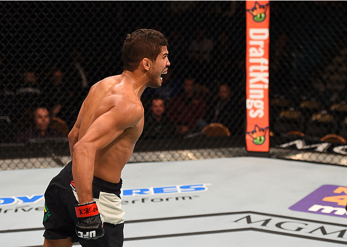 LAS VEGAS, NV - DECEMBER 12: Leonardo Santos of Brazil reacts to his victory over Kevin Lee in their lightweight bout during the UFC 194 event inside MGM Grand Garden Arena on December 12, 2015 in Las Vegas, Nevada. (Photo by Josh Hedges/Zuffa LLC/Zuffa