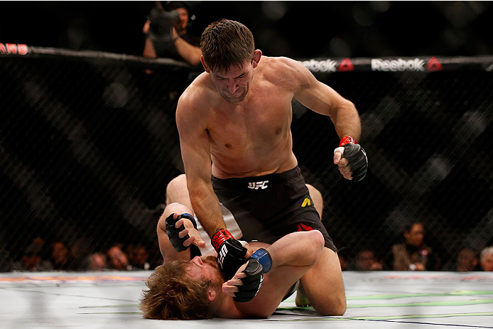 LAS VEGAS, NV - DECEMBER 12: Demian Maia of Brazil (top) punches Gunnar Nelson of Iceland in their welterweight bout during the UFC 194 event inside MGM Grand Garden Arena on December 12, 2015 in Las Vegas, Nevada.  (Photo by Christian Petersen/Zuffa LLC/