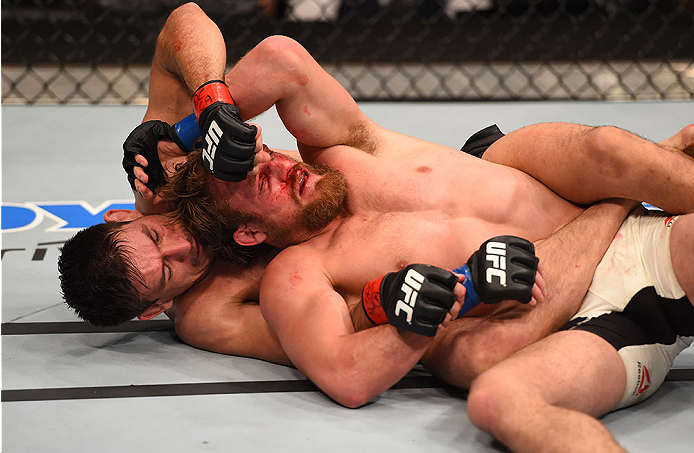 LAS VEGAS, NV - DECEMBER 12: Demian Maia of Brazil (left) grapples with Gunnar Nelson of Iceland (right) in their welterweight bout during the UFC 194 event inside MGM Grand Garden Arena on December 12, 2015 in Las Vegas, Nevada. (Photo by Josh Hedges/Zu