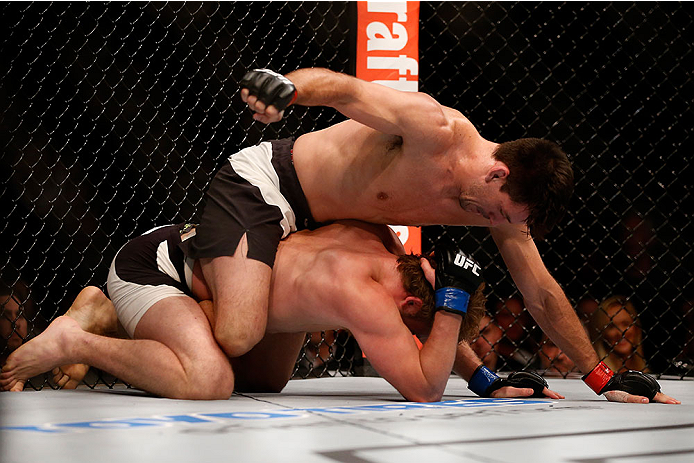 LAS VEGAS, NV - DECEMBER 12: (Top) Demian Maia punches Gunnar Nelson in their welterweight bout during the UFC 194 event inside MGM Grand Garden Arena on December 12, 2015 in Las Vegas, Nevada. (Photo by Christian Petersen/Zuffa LLC/Zuffa LLC via Getty