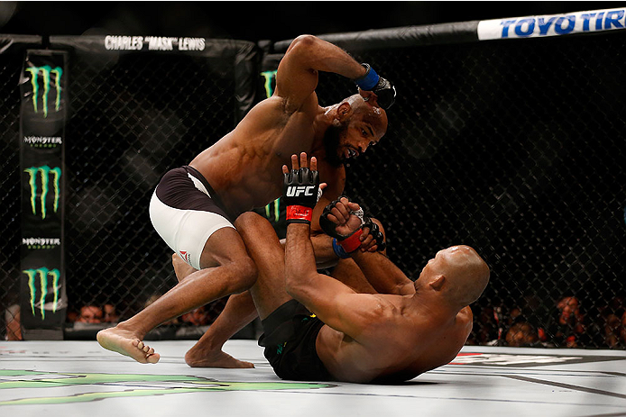 LAS VEGAS, NV - DECEMBER 12: Yoel Romero of Cuba (top) punches Ronaldo 'Jacare' Souza of Brazil in their middleweight bout during the UFC 194 event inside MGM Grand Garden Arena on December 12, 2015 in Las Vegas, Nevada. (Photo by Christian Petersen/Zuff