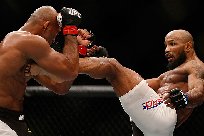 LAS VEGAS, NV - DECEMBER 12: (R-L) Yoel Romero of Cuba kicks Ronaldo 'Jacare' Souza of Brazil in their middleweight bout during the UFC 194 event inside MGM Grand Garden Arena on December 12, 2015 in Las Vegas, Nevada. (Photo by Christian Petersen/Zuffa