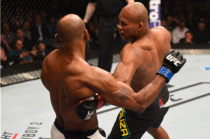 LAS VEGAS, NV - DECEMBER 12: (R-L) Ronaldo 'Jacare' Souza of Brazil punches Yoel Romero of Cuba in their middleweight bout during the UFC 194 event inside MGM Grand Garden Arena on December 12, 2015 in Las Vegas, Nevada.  (Photo by Josh Hedges/Zuffa LLC/Z