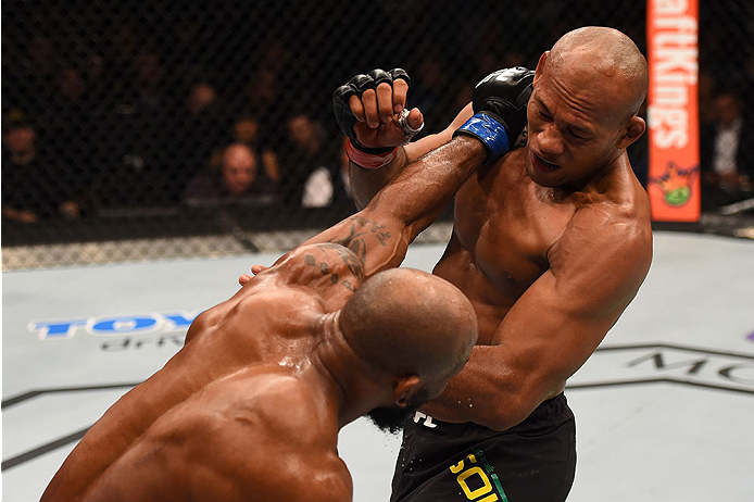 LAS VEGAS, NV - DECEMBER 12: (L-R) Yoel Romero of Cuba punches Ronaldo 'Jacare' Souza of Brazil in their middleweight bout during the UFC 194 event inside MGM Grand Garden Arena on December 12, 2015 in Las Vegas, Nevada. (Photo by Josh Hedges/Zuffa LLC/