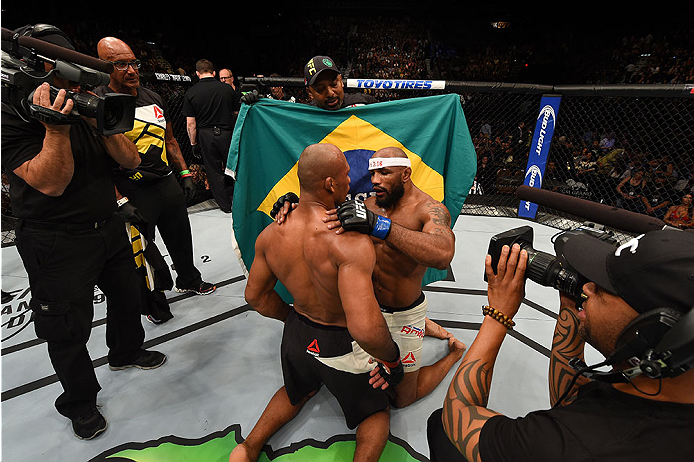 LAS VEGAS, NV - DECEMBER 12:  (L-R) Ronaldo 'Jacare' Souza of Brazil and Yoel Romero of Cuba embrace after their middleweight bout during the UFC 194 event inside MGM Grand Garden Arena on December 12, 2015 in Las Vegas, Nevada.  (Photo by Josh Hedges/Zuf