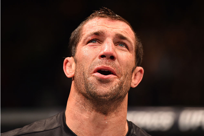 LAS VEGAS, NV - DECEMBER 12:  Luke Rockhold reacts to his victory over Chris Weidman in their UFC middleweight championship bout during the UFC 194 event inside MGM Grand Garden Arena on December 12, 2015 in Las Vegas, Nevada.  (Photo by Josh Hedges/Zuffa