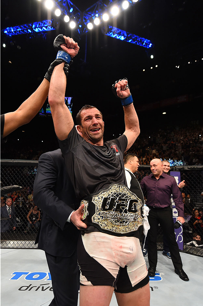 LAS VEGAS, NV - DECEMBER 12: Luke Rockhold reacts to his victory over Chris Weidman in their UFC middleweight championship bout during the UFC 194 event inside MGM Grand Garden Arena on December 12, 2015 in Las Vegas, Nevada. (Photo by Josh Hedges/Zuffa