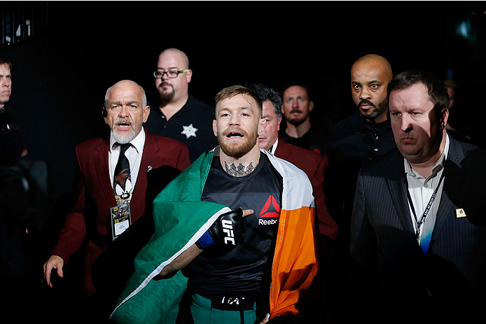 LAS VEGAS, NV - DECEMBER 12: Conor McGregor of Ireland walks to the Octagon to face Jose Aldo of Brazil in their UFC welterweight championship bout during the UFC 194 event inside MGM Grand Garden Arena on December 12, 2015 in Las Vegas, Nevada.  (Photo b