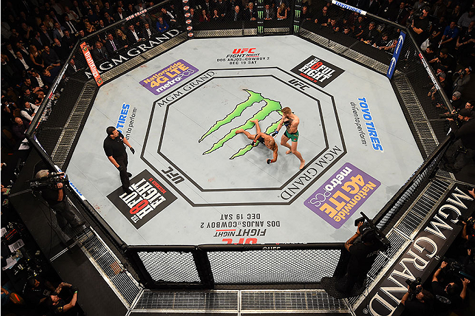 LAS VEGAS, NV - DECEMBER 12:  An overhead view of the Octagon as Conor McGregor of Ireland punches Jose Aldo of Brazil during the UFC 194 event inside MGM Grand Garden Arena on December 12, 2015 in Las Vegas, Nevada.  (Photo by Zuffa LLC/Zuffa LLC via Get